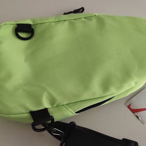 Nike crossbody bag, green, with Just Do It print
