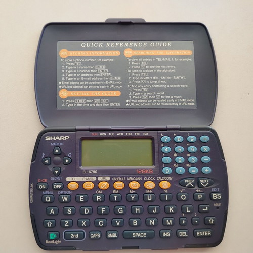 Sharp EL-6790 electronic organizer used, with external marks