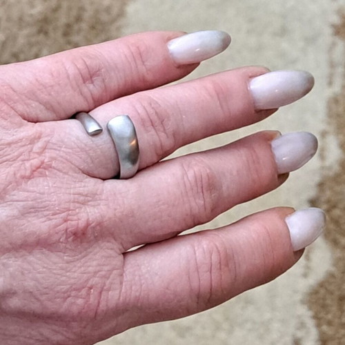 Silver ring with open spiral design like new