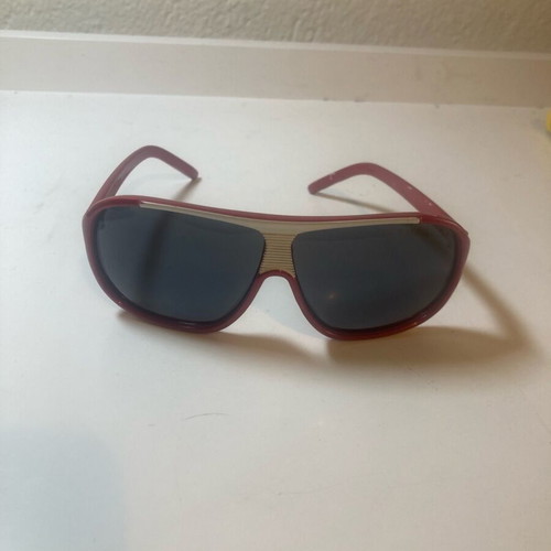 Children's sunglasses used with red frame and white detail