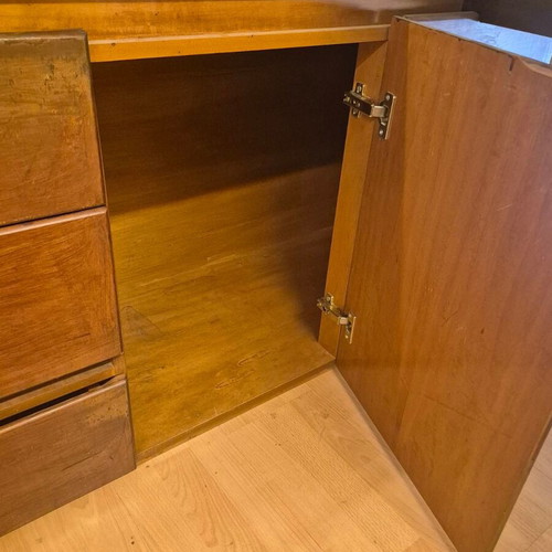 Corner desk with glass surface used, wooden base and storage