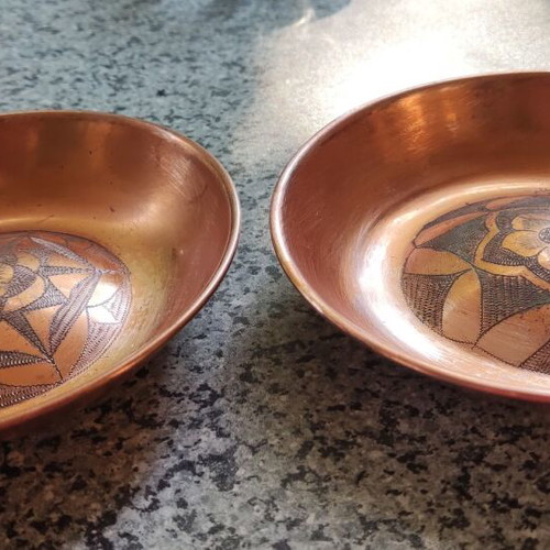 Brass decorative plates set with handmade carving used