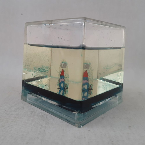 Water decoration with floating sailboat used