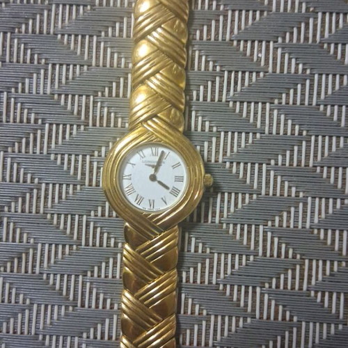 Longines wristwatch 1990 used, gold color, needs battery
