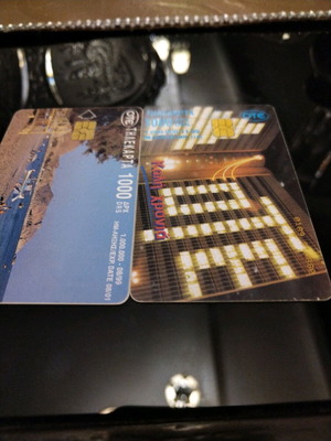 Phone cards used with minor scratches and ink mark