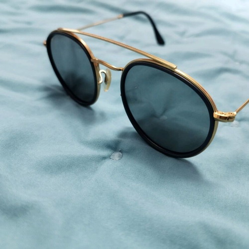 Estilo sunglasses new with blue mirror lenses
