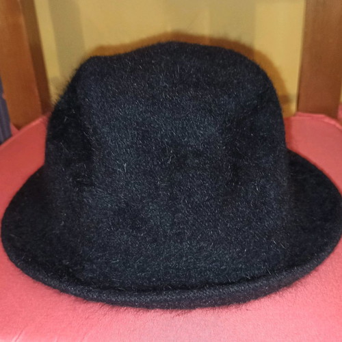 Fuzzy bucket hat used, size M
