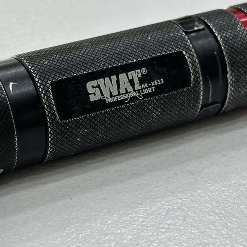 Swat NK-X613 Professional Light flashlight used, rechargeable 9800mAh battery