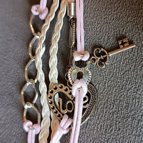 Love bracelet set new with white and pink cords and charms