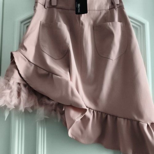 Upcycled asymmetric skirt with ruffles and pink feathers, SBETRO