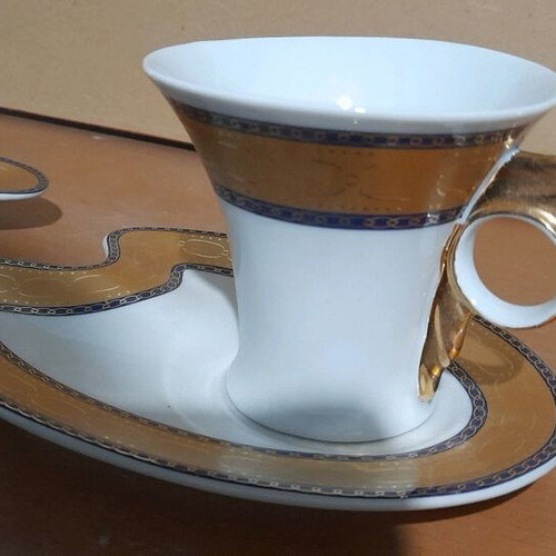 Limoge coffee cup set used, 2 cups with Hermes feather design