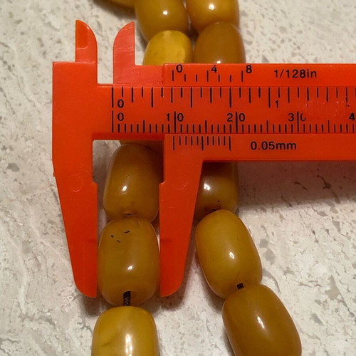 Worry beads used from royal amber with silver logo