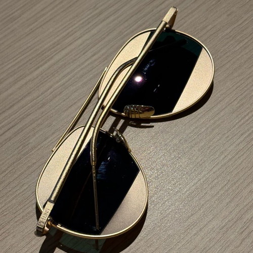 Luna Australia sunglasses used, gold with purple-pink lenses