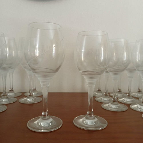 Vintage set of 48 stemmed glasses with swirl engraving for 12 people