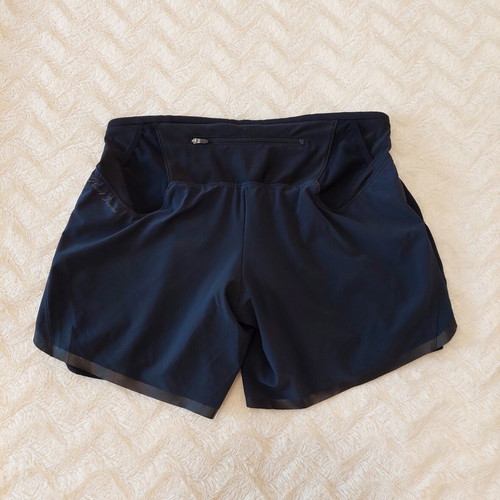 Pearl Izumi sports shorts with built-in leggings, size M, black