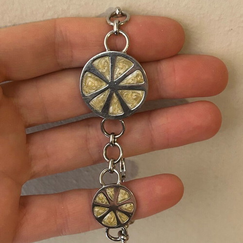 Bracelet new with adjustable size, yellow and silver