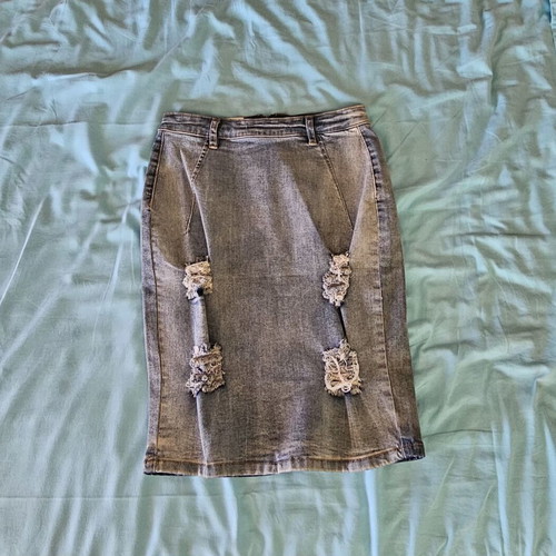 Denim pencil skirt new with modern rips and faded blue color, size S