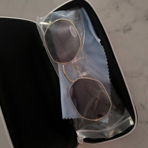 Sunglasses with brown lenses and gold frame, new with UV protection