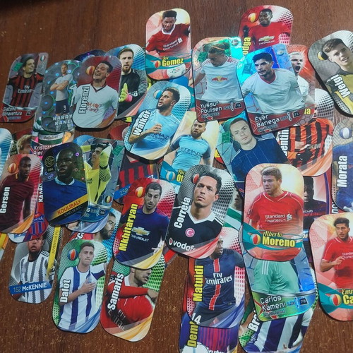 Metal tags with football players, pack of 45, like new