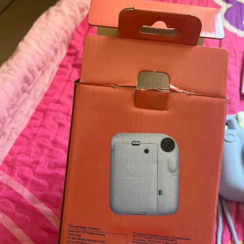 Instax Mini 12 brand new instant camera with film