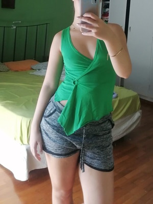 Green blouse with ring detail, size Small