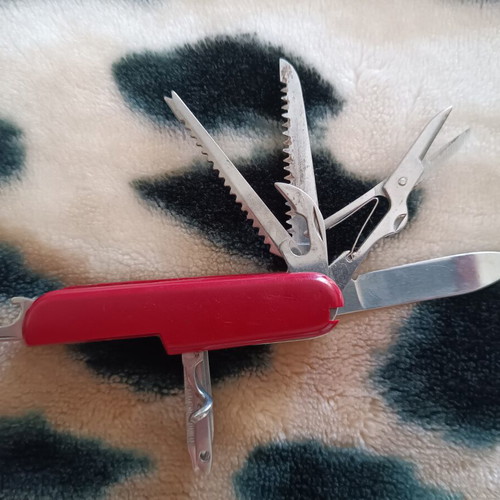 Swiss multitool pocket knife with 11 tools like new