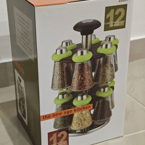 Rotating spice rack with 12 glass containers
