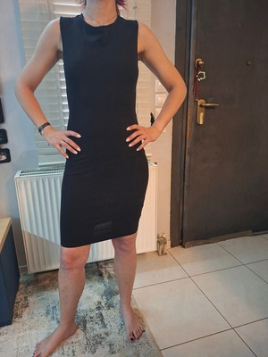 Black evening dress with crisscross back new, size medium