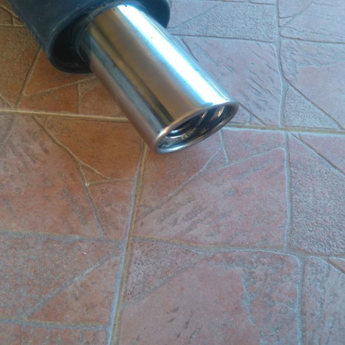 Exhaust tip used with mats included
