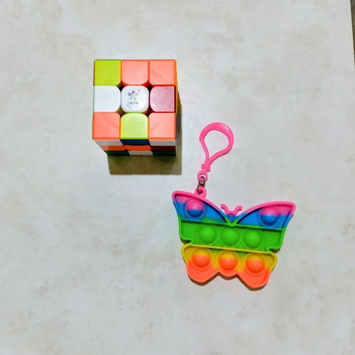 Rubik's Cube 3x3 and Butterfly Pop It Fluo Set like new