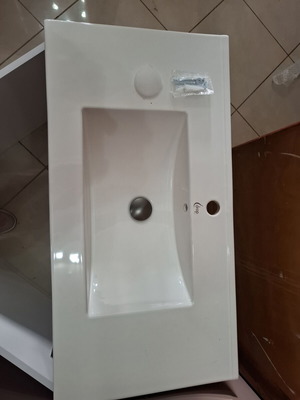 Bathroom cabinet with hanging sink countertop like new