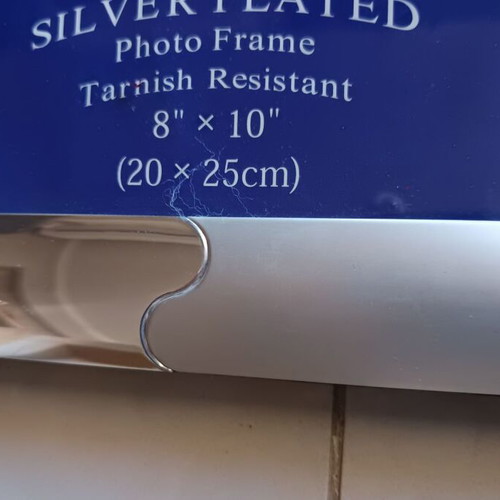 Silver photo frame like new with glossy and matte surface
