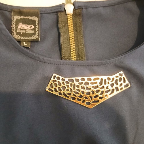 Iso blue blouse with sewn jewelry