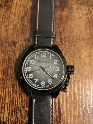 Chevignon men's watch used with leather strap and 3 Atm water resistance