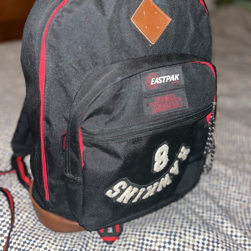 Eastpak Stranger Things backpack used, black with stain
