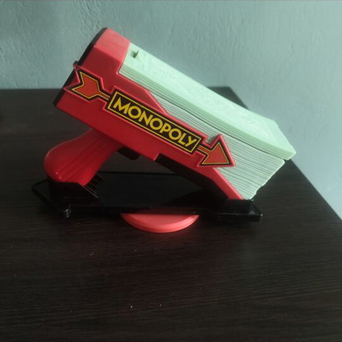 Monopoly Money Gun board game like new