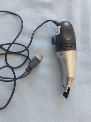 USB Mini Vacuum Cleaner used with LED light for keyboard and laptop