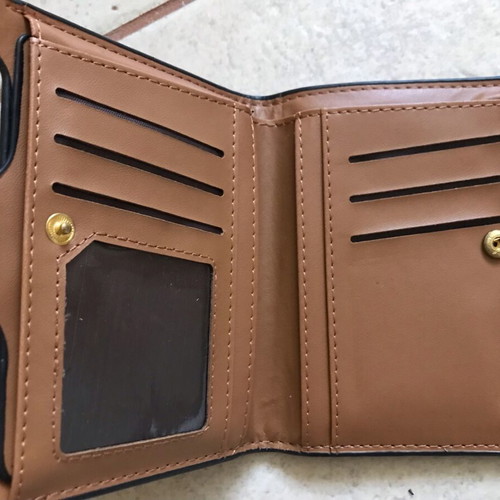 Patent leather wallet like new with zipper, black and brown