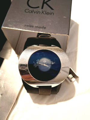 Calvin Klein collectible round watch used, black strap, scratched dial