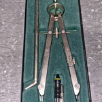 Used compass with case