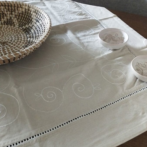 Linen tablecloth like new in earthy soft gray beige with embossed embroidery