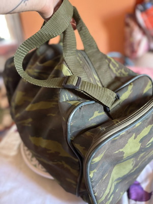 Military camouflage bag with straps used