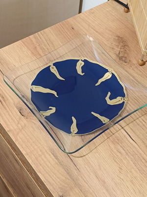 Square glass decorative plate Hilton McConnico like new with golden peppers