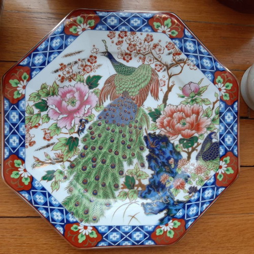 Porcelain plate used with Asian designs, blue, white, red