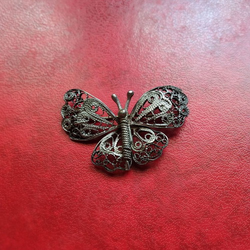 Filigree butterfly brooch used, silver color