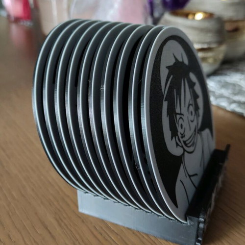 One Piece Coaster Set like new, 10 pieces with stand