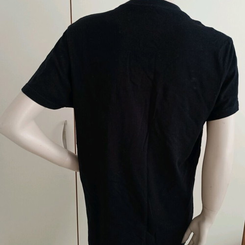 Women's black short-sleeve t-shirt with clown print like new, size M