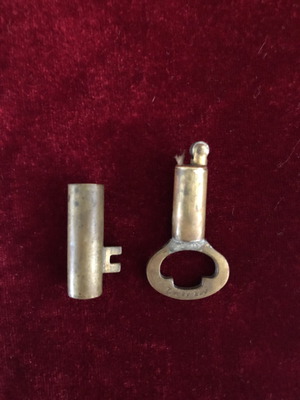 Antique brass lighter in key shape