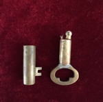 Antique brass lighter in key shape