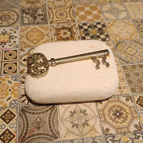 Stone decorative piece with key used